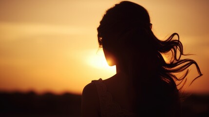 Poster - Silhouette of a woman with her hair blowing in the wind. Suitable for various themes and concepts