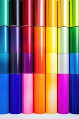 Poster - A close-up view of a variety of vibrant colored rolls of foil. This image can be used for various purposes