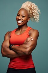Aufkleber - A woman wearing a red tank top striking a pose for a photo. Suitable for various uses