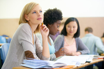 Wall Mural - Student, woman and thinking in university classroom, information and notes for studying. People, planning and knowledge in education for learning, problem solving and ideas for solution in assessment