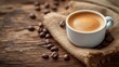 © nataliia_ptashka - Cup of coffee showcased on a wooden background. Black coffee with beans on vintage table. Copy space for text