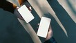 © Heinrich - Two people exchanging contact information over smartphones with blank screens