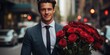 An elegant man in a suit with a bouquet of roses in the city