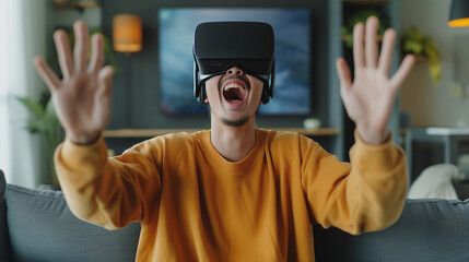 Excited young asian man wearing VR virtual reality glasses at living room and playing video game, technology concept