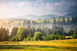 © Leonid Tit - Peaceful view of the mountainous area with fog in the morning. Carpathian National Park, Ukraine, Europe.