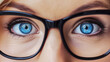 close up of eye with eyeglasses