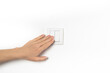 © Jovana - Closeup of hand and light switch. Womans hand with fingers on light switch, about to turn off the lights. Horizontal format. White wall.