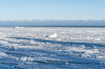 Wall Mural - frozen sea nad rocks