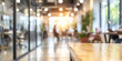 © RemsH - Beautiful blurred background of a corporate office interior, a bright, modern open space with good lighting.