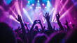 © MP Studio - lively crowd at a concert, with hands raised in the air, silhouetted against a backdrop of vibrant stage lights, capturing the energy and excitement of a live music event.