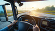 © Studio Nova - first-person view of a driver's hands on a steering wheel