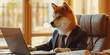 Shiba Inu doge wearing a suit working on a laptop computer in an office cubicle