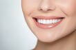 woman smiling wearing white dental floss