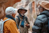 Fototapeta  - An elderly African American man engaging in a lively conversation with his peers during a hike, showcasing active senior lifestyle and social interaction.