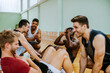 © Marko Geber - Young people playing basketball in an indoor basketball gym