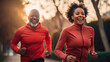 Happy african american couple of middle aged adults jogging through sunlit city streets