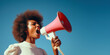 © Boadicea - Black woman with a megaphone, blue sky background