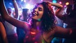 © Elchin Abilov - Nightlife and disco concept. Young people are dancing in club