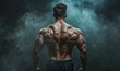 © VolumeThings - Attractive male body builder viewed from the back on a smoky background