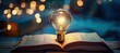 © Bussakon - Illuminating pages of open book with glowing light bulb symbolizes enlightening power of education research and creative thinking book possibly piece of literature or scholarly text