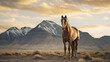 A horse with a mountain range in the background