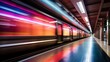 A subway train speeds through a station with a blurred background