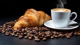Fototapeta Mapy - coffee and croissant isolated in black background