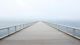 Fototapeta Przestrzenne - Wooden bridge crossing a tranquil body of water on a foggy morning, AI-generated.
