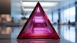 A radiant magenta pyramid with a mirror-like finish