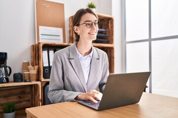 Sticker - Young caucasian woman business worker using laptop working at office