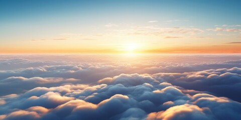 Wall Mural - Aerial view of Beautiful sunrise sky above clouds or fog with dramatic light at dawn.