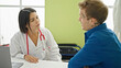 © Krakenimages.com - Doctor having medical consultation with patient at the clinic