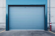 © Wararat - Roller door or roller shutter, concrete floor in industrial building i.e. modern factory, plant, warehouse, shop, garage or store.
