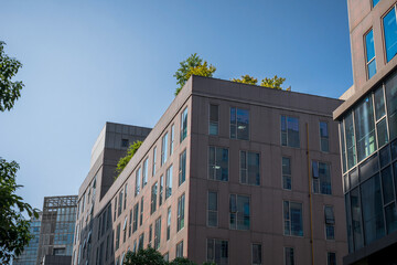 Canvas Print - Close-up of a modern business city building looking up