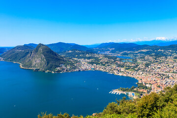 Wall Mural - Scenic view of lake Lugano from Monte Bre mountain in Ticino canton, Switzerland