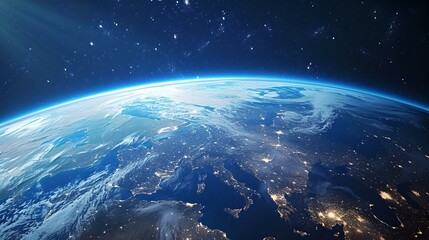 stunning view of earth from space at night, illuminated continents under twilight sky. ideal for bac