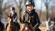 Happy young girl at equitation lesson smiling while riding a horse, wearing horseriding helmet