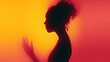 © Vladimir - Female blurred silhouette on a orange background. Elegant outline of a woman in motion out of focus