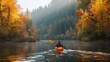 Ein Kajakfahrer auf einem Fluss im Herbst 