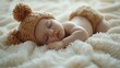 © Viktor - Sleeping Baby in a Knitted Hat