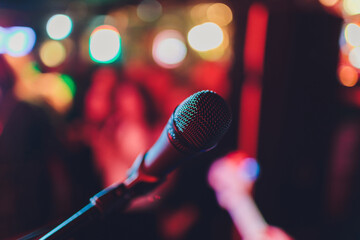 Wall Mural - Close up of microphone in concert hall or conference room.