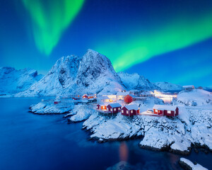 Wall Mural - View on the house in the Hamnoy village, Lofoten Islands, Norway. Landscape in winter time during blue hour. Mountains and water. Travel image