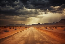 Long Road In The Desert. Storm Clouds At The Horizon.