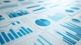 Fototapeta Panele - close-up of a collection of business documents with various types of charts and graphs