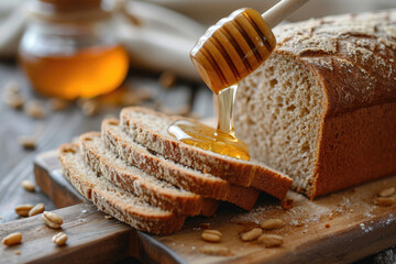 Wall Mural - close-up of a loaf of wheat bread on a wooden cutting board.