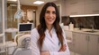 © buraratn - Portrait of female dentist .She standing in her dentist office.