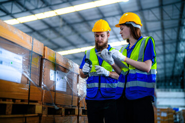 operation workers checking and inspecting cargo for stack items for shipping. males worker checking the store factory. industry factory warehouse. Worker Scanning Package In Warehouse.