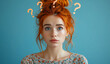 ©  J. GALIÑANES STOCK - Young red head woman expressing doubt on her face, with question symbols around her head. Image for advertising, web or commercial.