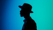 © Manu Prats - Young afro american man wearing hat against blue cool background