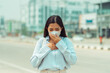 © joyfotoliakid - Asian Women wearing Protection Mask feels headaches and cough due to air pollution PM 2.5 Air pollution caused health problems. environmental pollution